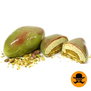 Pistachio mousse dessert with chopped pistachios and glossy glaze Belgique Patisserie UK