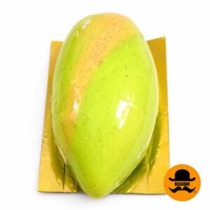 Pistachio dessert cross section showing mousse and praline filling Belgique Patisserie