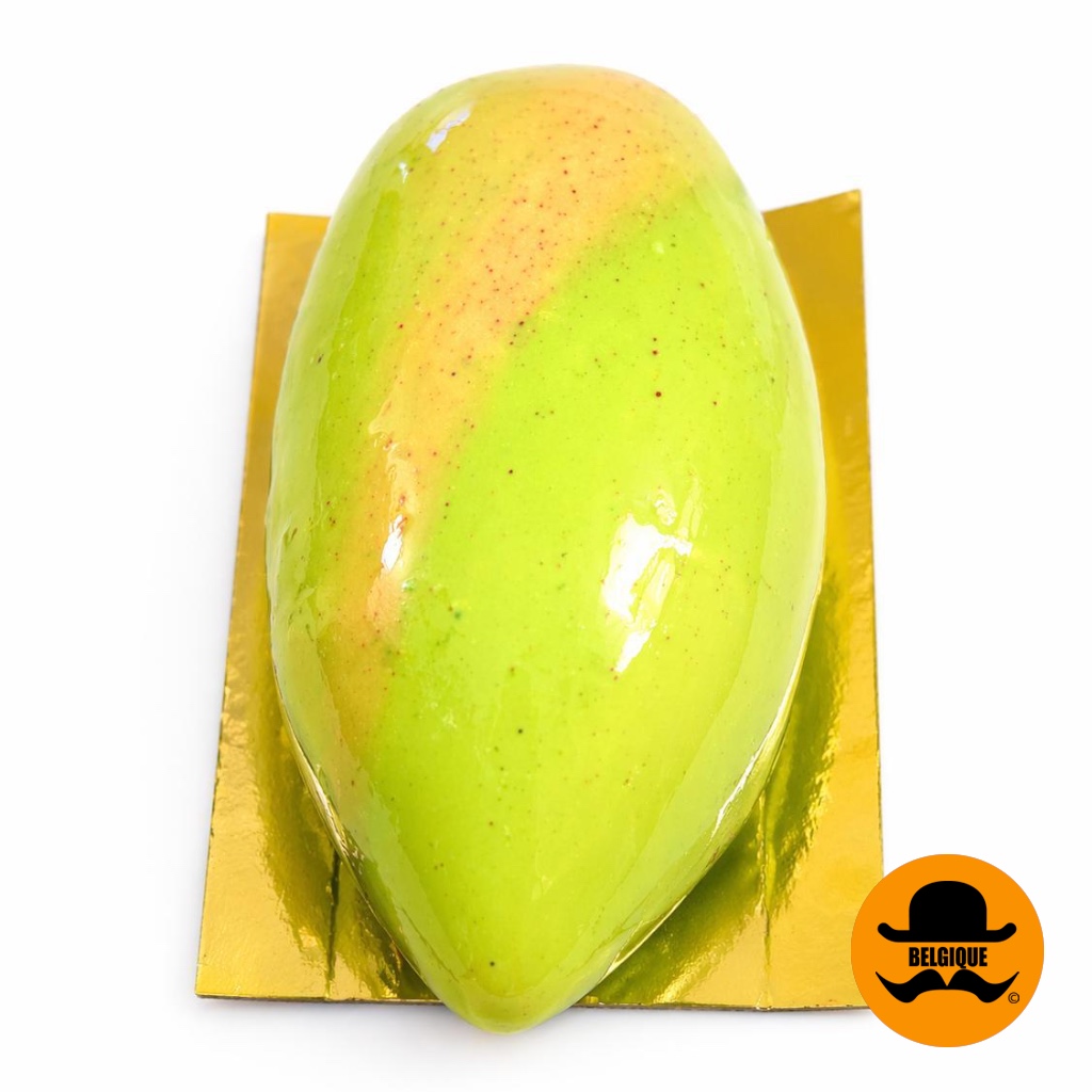 Pistachio dessert cross section showing mousse and praline filling Belgique Patisserie